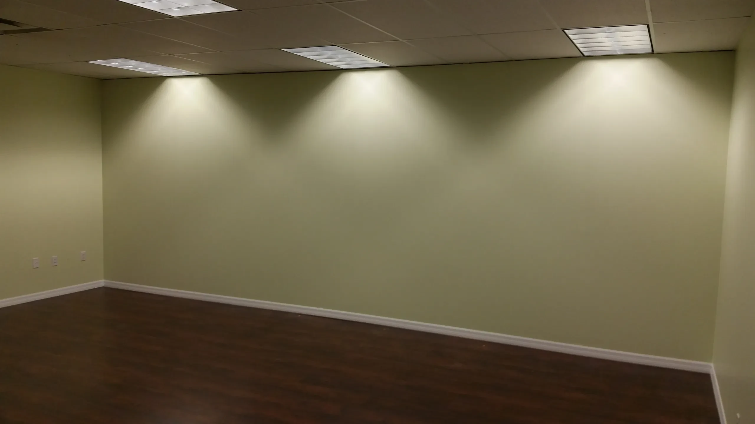 Finished commercial space with painted walls and new flooring